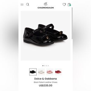 Girls black luxury patent leather ballerina shoes by Dolce & Gabbana. New